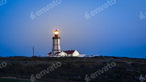 Preview: Lighthouse Cabo Espichel in Sesimbra, Portugal at night time
