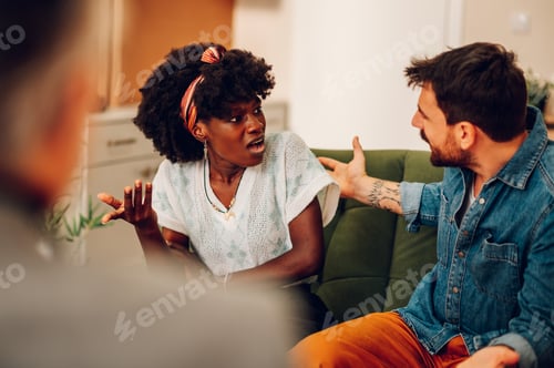 Preview: Diverse couple on a therapy session in a psychologist office