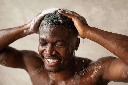 Preview: Black Guy Washing Head With Shampoo Taking Shower In Bathroom