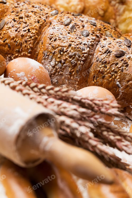 Preview: Cooking. Delicious bread, bagels and eggs on the table