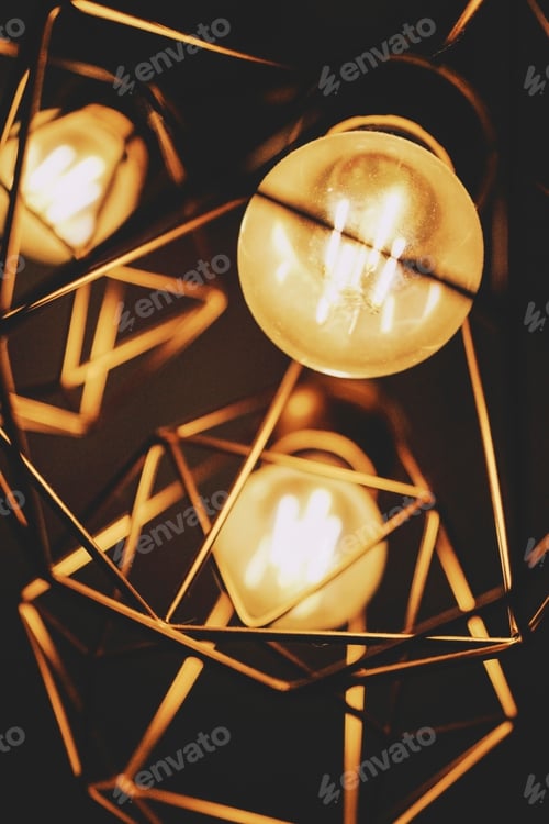 Preview: Low view of a golden geometric lamp