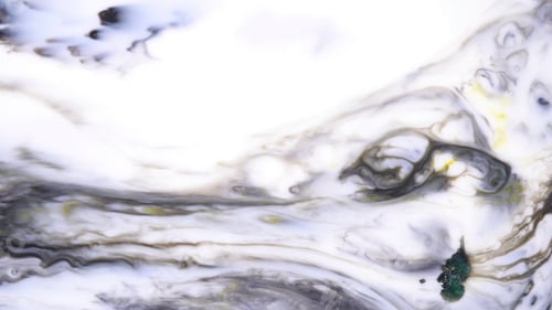 Preview: Beautiful motion of liquid paints in milky substance, art concept. Reaction of putting soap drops to