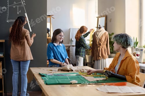 Preview: Smiling Girls with Disability in Tailoring Class in Atelier