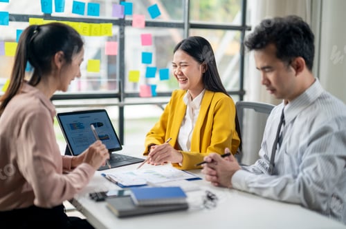Preview: Team Brainstorming Together on Project in Office