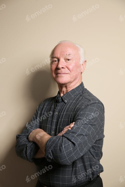 Preview: Portrait of elderly man on color background