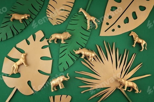 Preview: Abstract background with golden tropical leaves and exotic animals