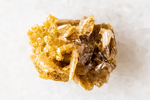 Preview: sample of raw cerussite mineral on white marble