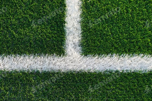 Preview: green synthetic grass surface on a soccer ground, european football field with artificial grass