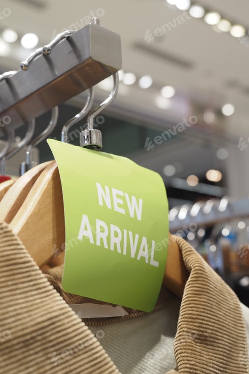 Preview: Fresh collection sign at a clothing store display