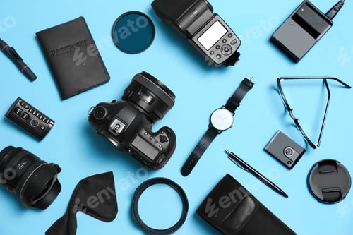 Preview: Flat lay composition with professional photographer equipment and accessories on color background