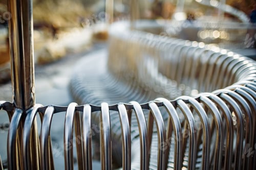 Preview: Close-up street bench metal pipes arranged parallel