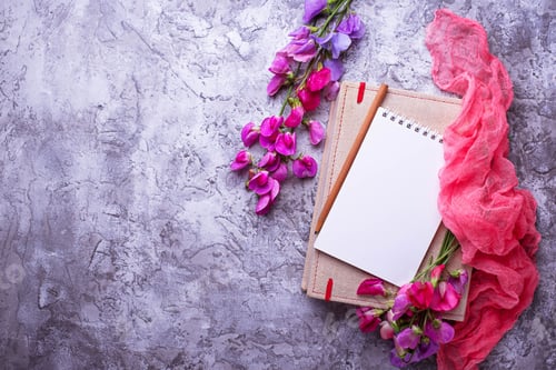 Preview: Open empty notebook and flowers.
