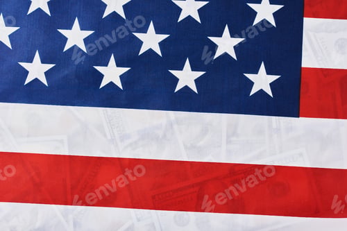 Preview: Close up of american flag over many usd dollar bills. Financial concept