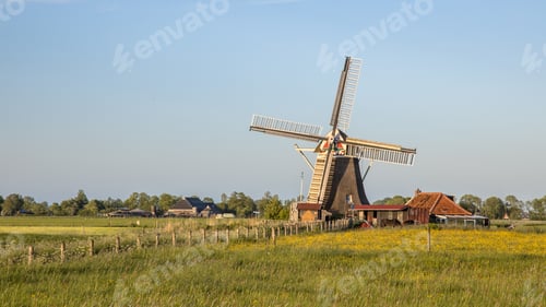 Preview: Wooden windmill on countryside