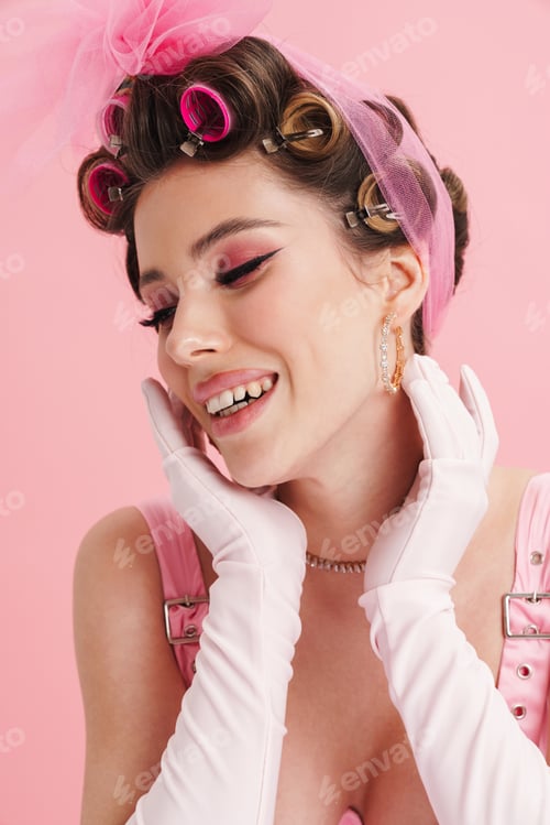 Preview: Young white woman wearing gloves smiling while posing at camera