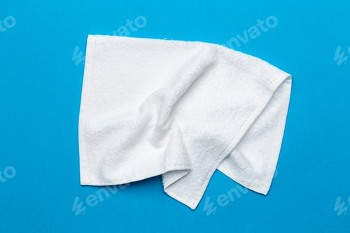 Preview: White towel on a blue background for cleaning and drying needs in various settings