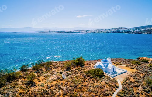 Preview: Small whitewashed orthodox church by the sea, aerial view