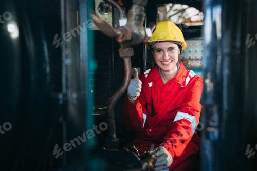 Preview: Portrait of Industrial engineers inspect and perform maintenance on the machines at factory.