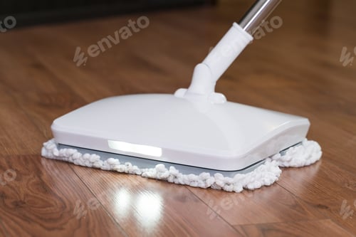 Preview: A man washes the floor in an apartment with a modern electric mop