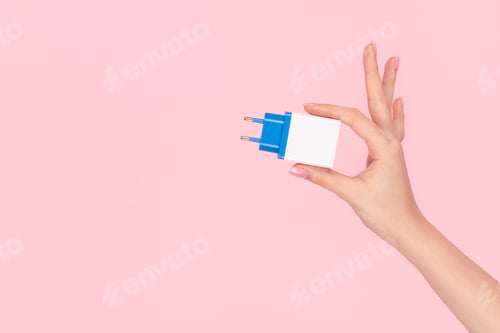 Preview: Crop hand showing USB plug