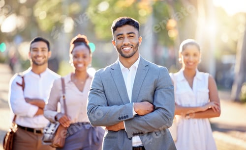 Preview: Shot of a diverse group of businesspeople standing together in the city after a day in the office