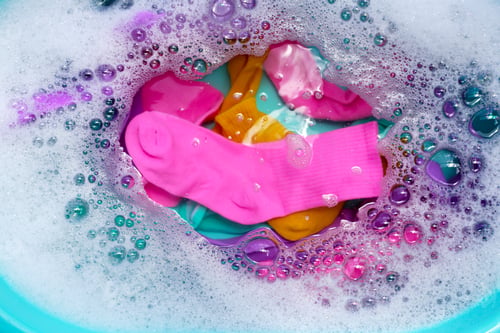 Preview: Cleaning dirty socks in basin of soapy water