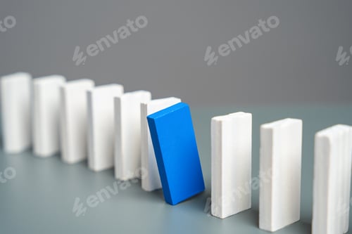 Preview: A blue domino peeks out from a row of white ones. S
