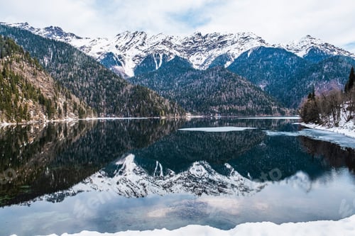 Preview: Lake Ritsa in the spring season. Located in Abkhazia, in the Caucasus Mountains.