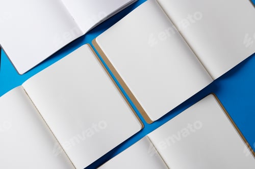 Preview: Close up of open books with copy space on blue background