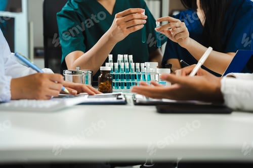 Medical Professionals Work with Samples in Workplace