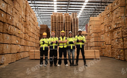 Preview: Portrait of a group of workers work in a woodworking factory,