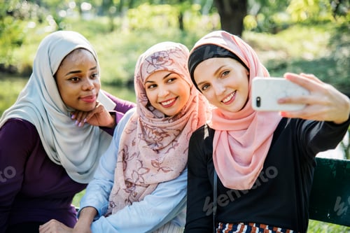 Preview: Islamic women friends taking selfie together
