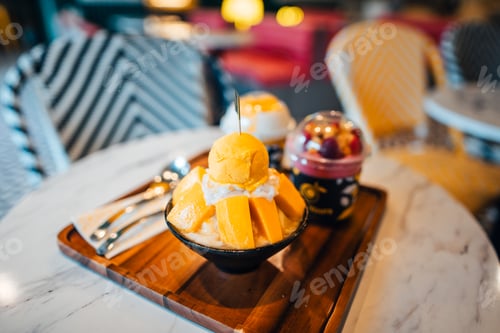 Preview: Mango ice cream in a cup at a seaside cafe