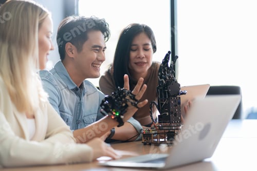 Preview: Young students researching inventions with modern technology