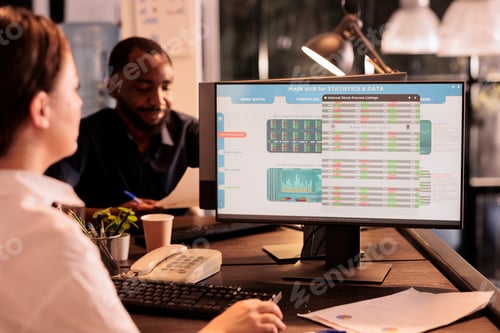 Preview: Woman monitoring company investment revenue using fund market software