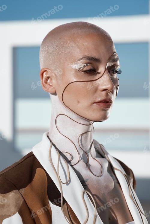 Closeup shot of a beautiful young woman showing off an unconventional make-up look