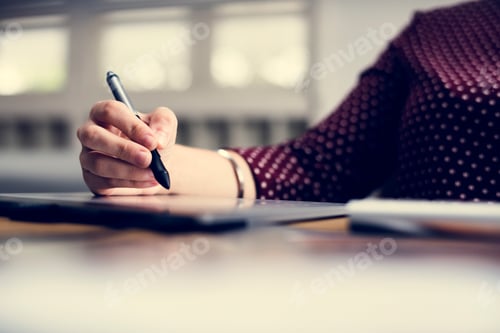 Preview: Close up of people's hand working on computer