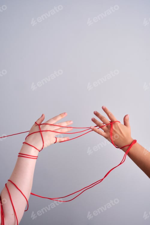 Preview: Connected hands creating red string relationship