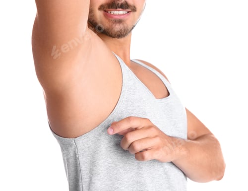 Preview: Young man showing armpit on white background, closeup. Using deodorant