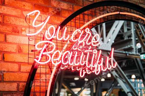 Preview: You are beautiful red neon sign. Motivation red neon text You are beautiful on the wall
