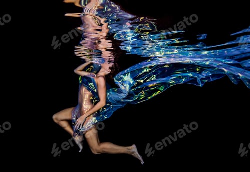 Preview: Woman underwater in jellyfish fabric