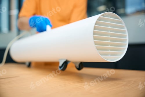 Preview: Cleaning worker uses an ozone generator while cleaning coworking space