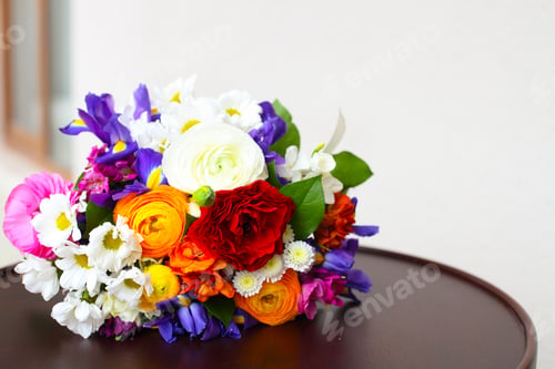Preview: Unusual bright wedding bouquet with ranunculus