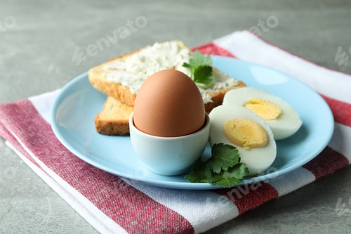 Preview: Concept of tasty breakfast with boiled egg, close up