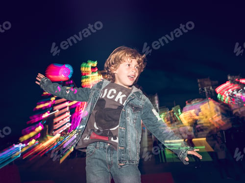 Preview: Boy jumping on funfair