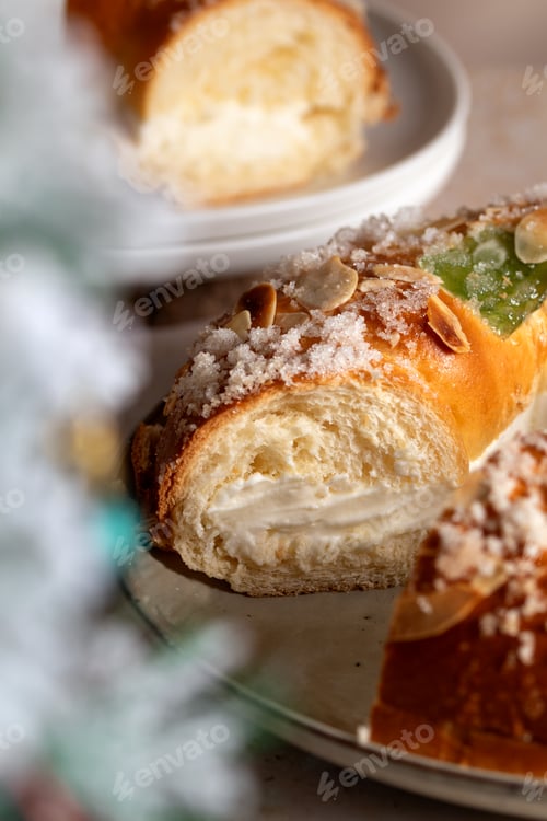 Preview: Spanish Three kings cake on decorated table with Christmas tree, celebration of Three Kings Day
