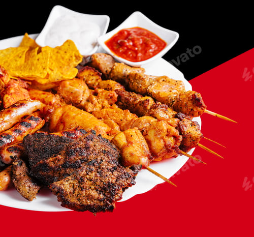 Preview: Assorted meat on a plate close up