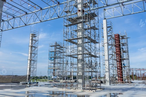 Preview: Scaffolding and steel structure on muddy construction site