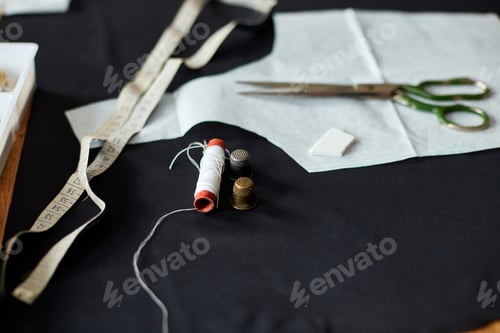 Preview: Top view of Sewing supplies on a wooden table
