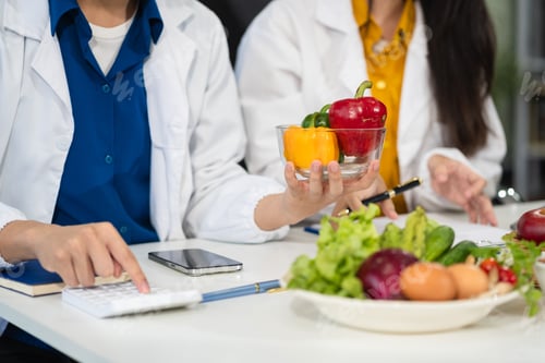 Preview: Team Microbiologists Analyzing Molecular Samples in Advanced Food Science Laboratory